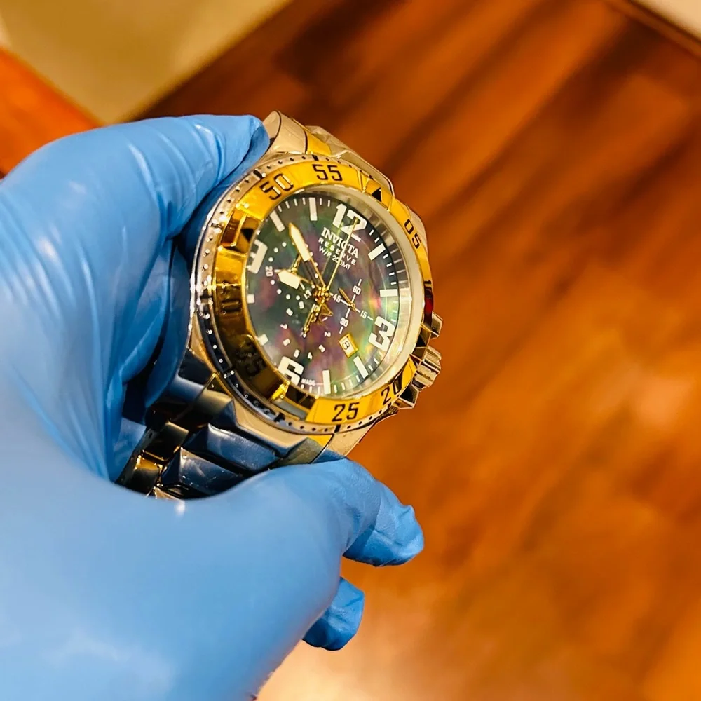 Invicta Reserve Excursion Gold and Silver High Polish watch.